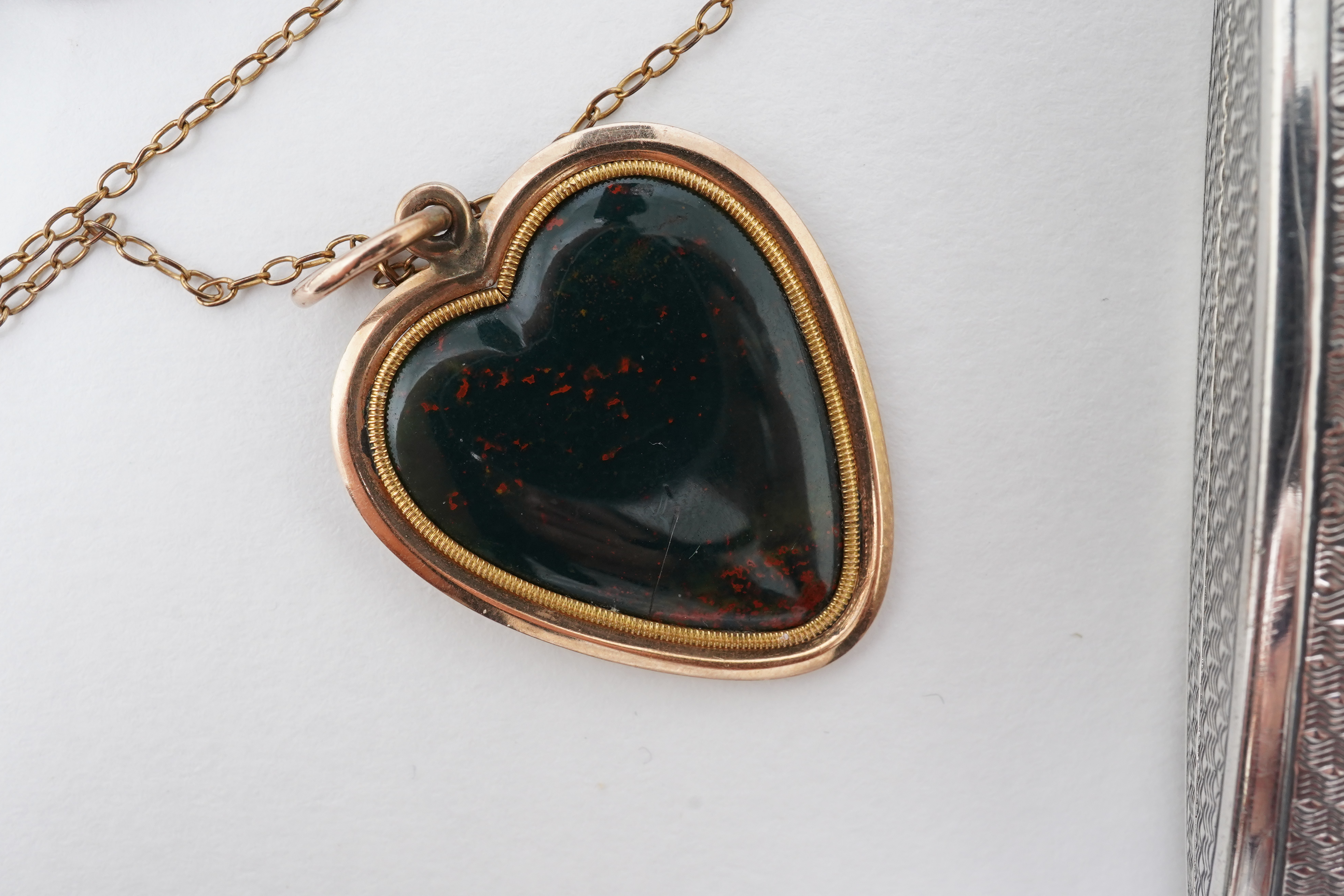 A collection of jewels and accessories including a moonstone bracelet